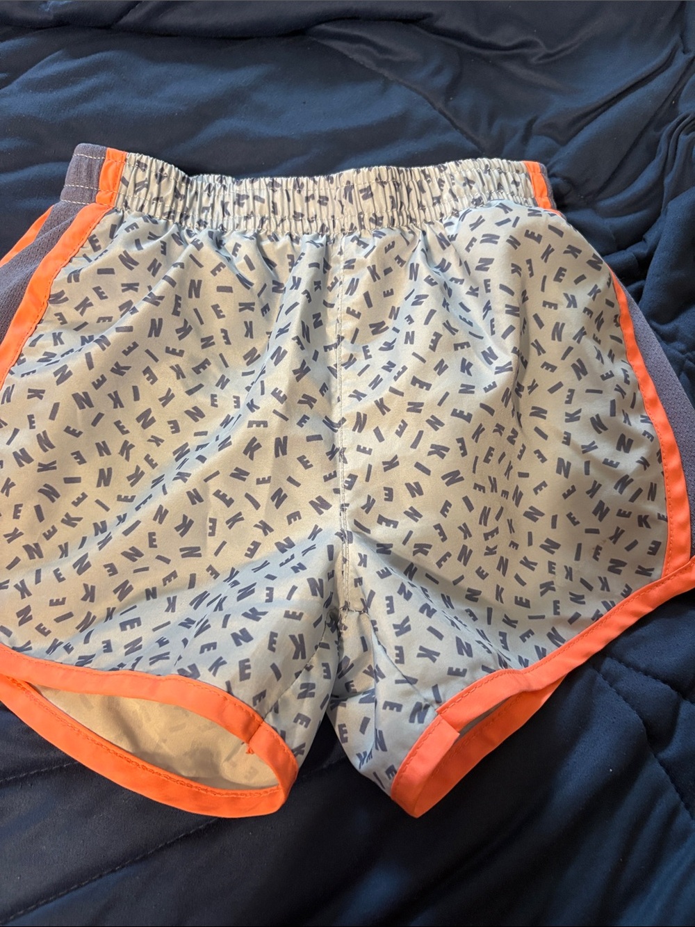Nike Kids Light Gray Shorts with Orange Trim